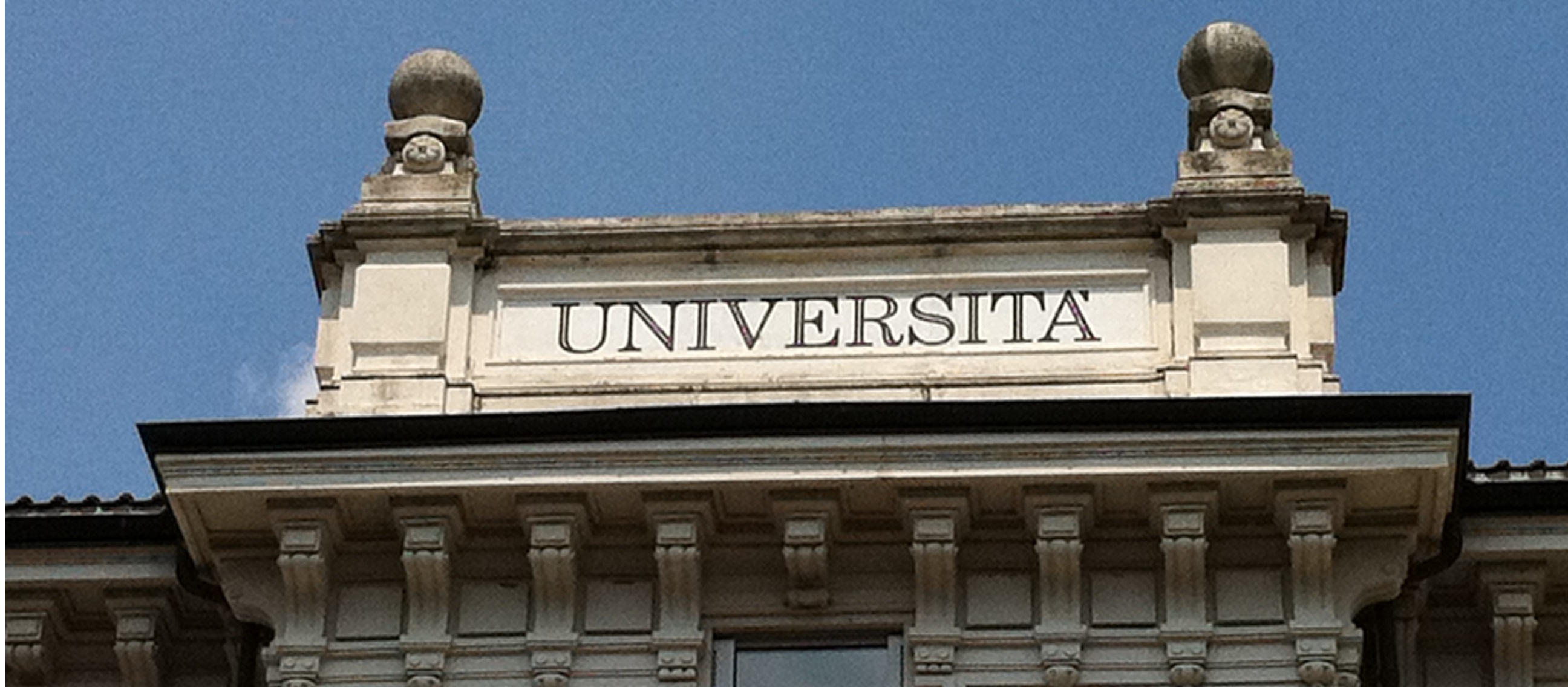 università